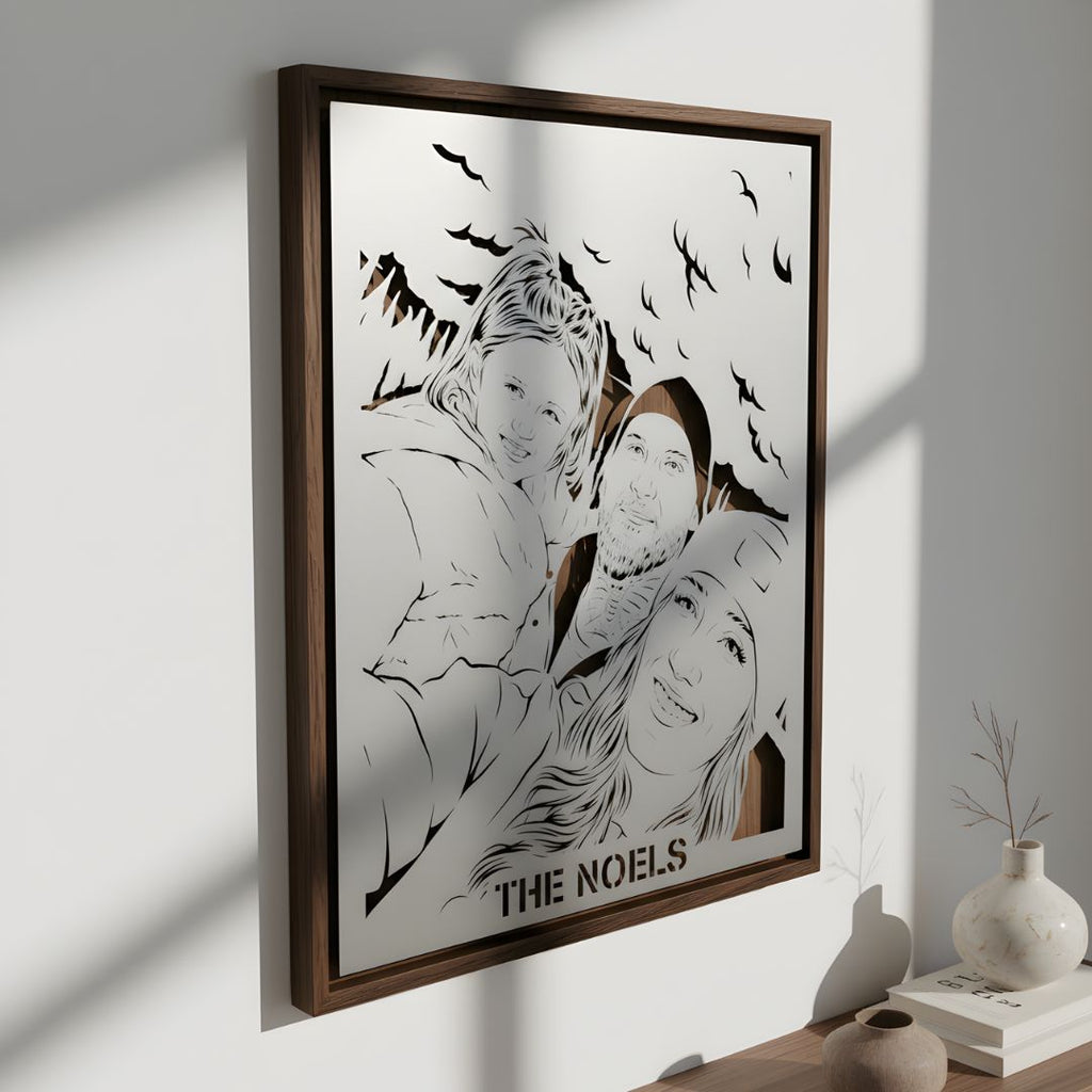 Family selfie with birds overhead and the family name cut below, walnut frame