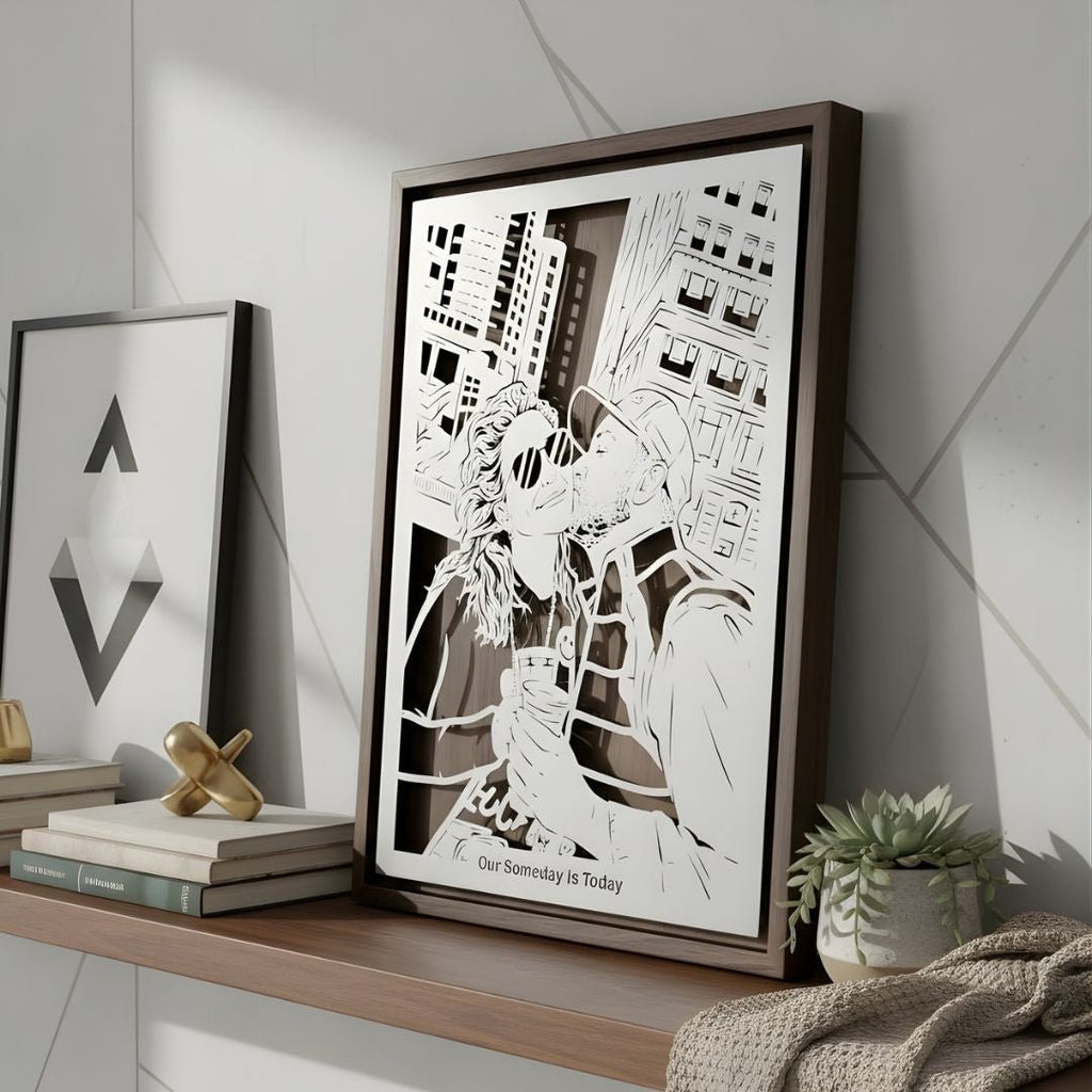Couple kissing on a city street with background art, steel portrait in a black frame
