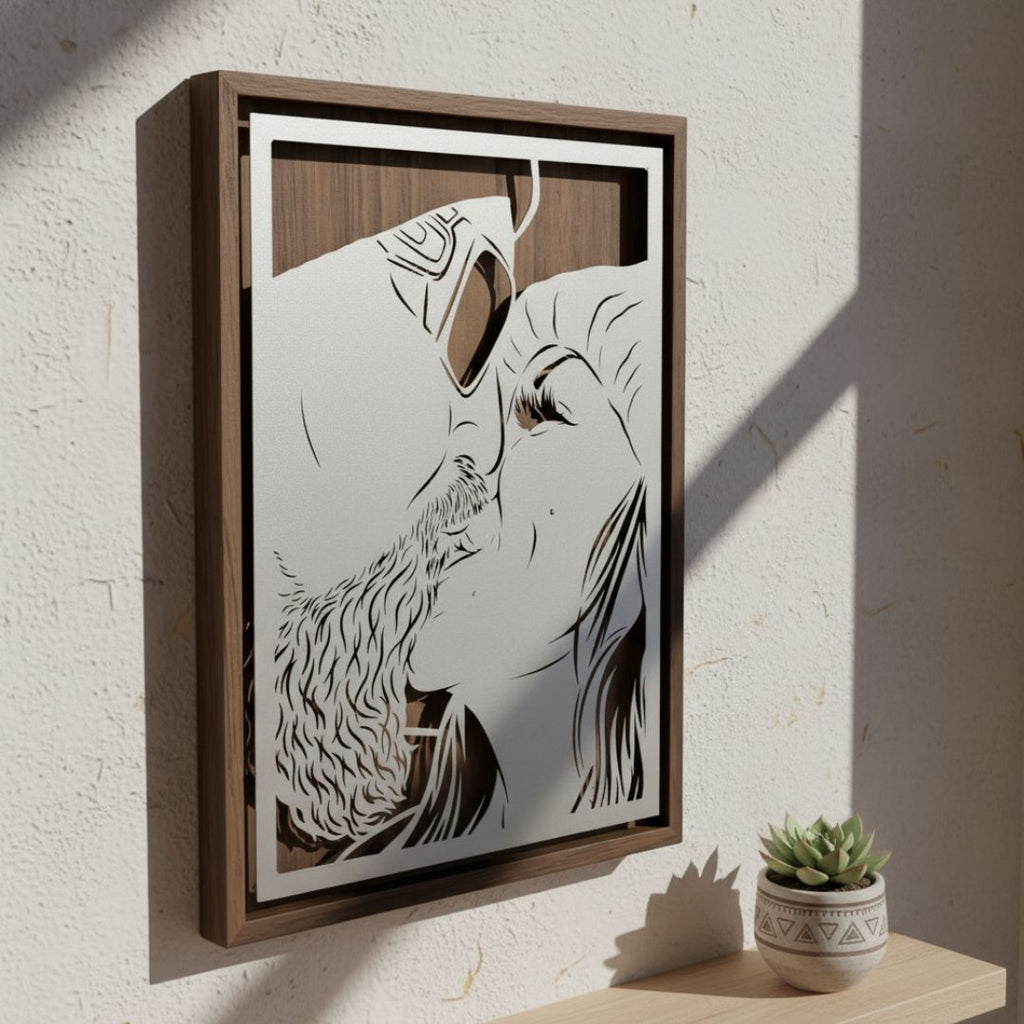 Custom metal portrait of a couple kissing, close-up, silver steel floating over walnut in a walnut frame