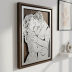 Couple kissing, steel portrait with the walnut backer showing through, walnut frame