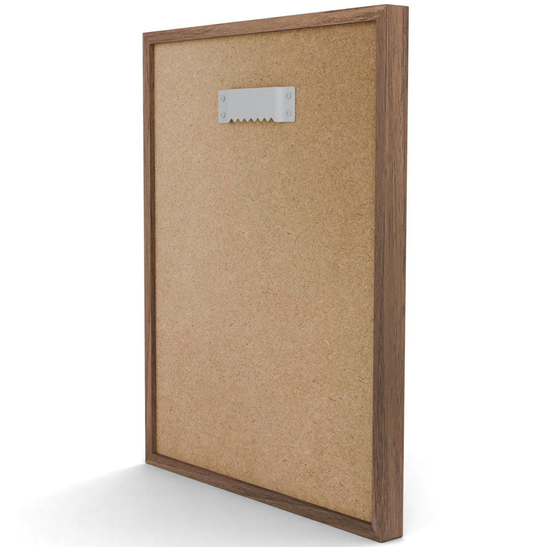 Cork bulletin board with wooden frame on a white background