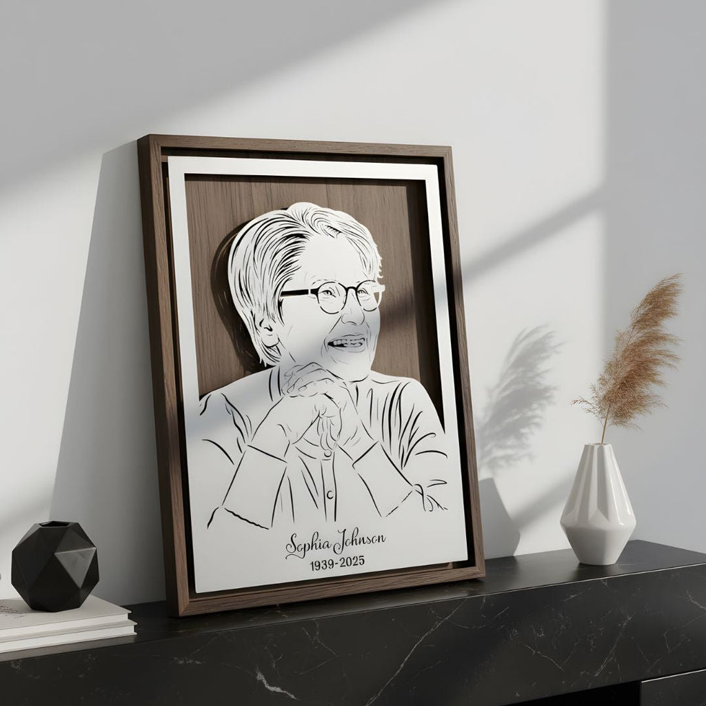 Memorial portrait of a grandmother on a mantel, steel in a walnut frame with her name and years below
