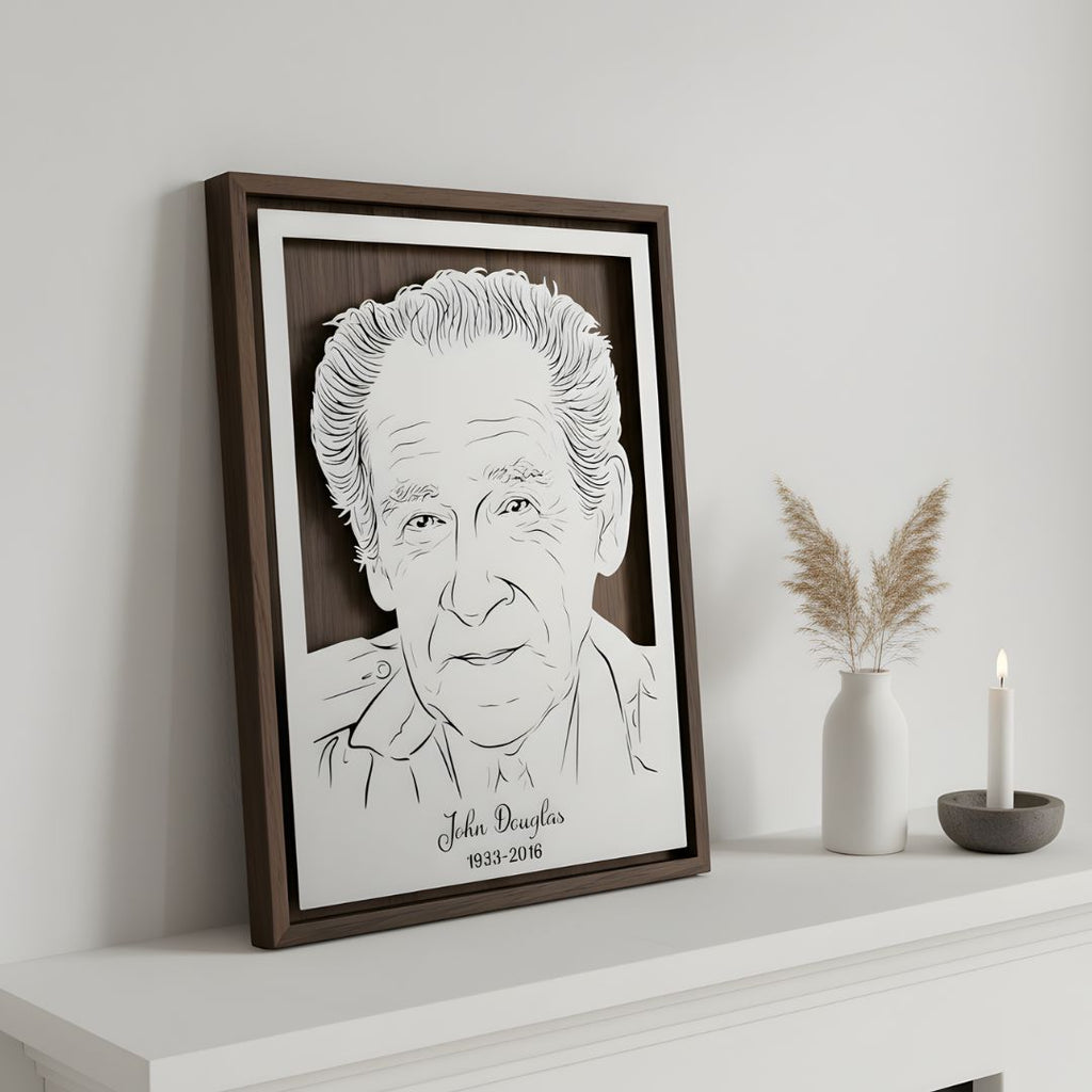 Memorial portrait of an older man, laser cut steel in a walnut frame with his name and years below