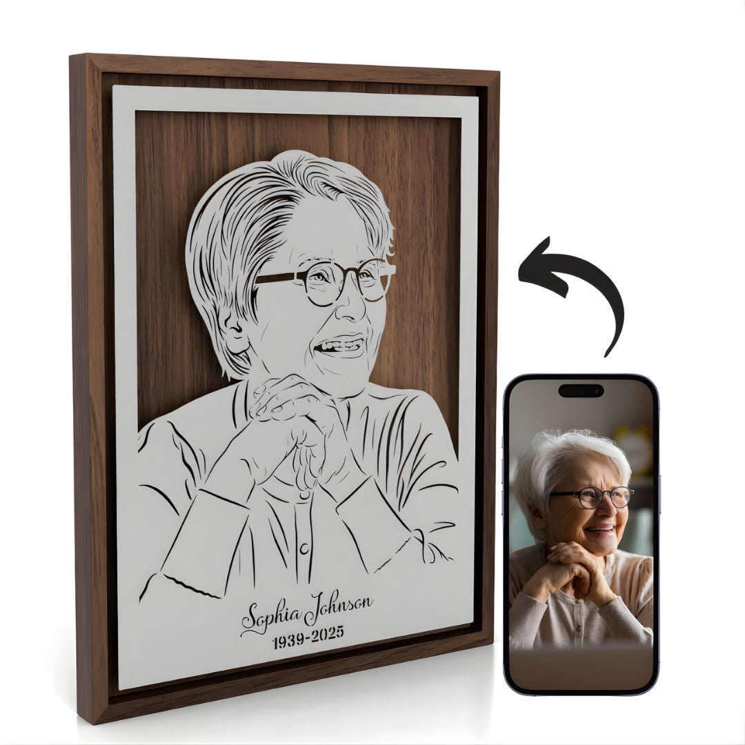 Framed memorial portrait of a smiling grandmother, steel in a walnut frame with her name and years below, next to the photo it was drawn from