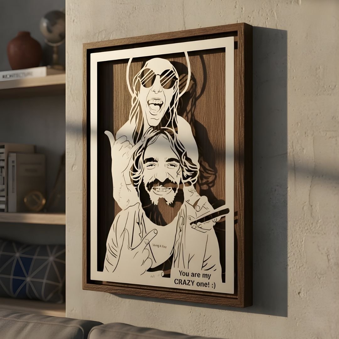 Laughing couple in sunglasses, steel portrait in a walnut frame with a playful line below