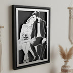 Wedding couple sitting together, laser cut steel portrait in a black frame