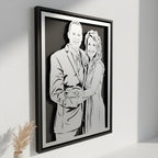 Bride and groom smiling together, steel anniversary portrait in a black frame