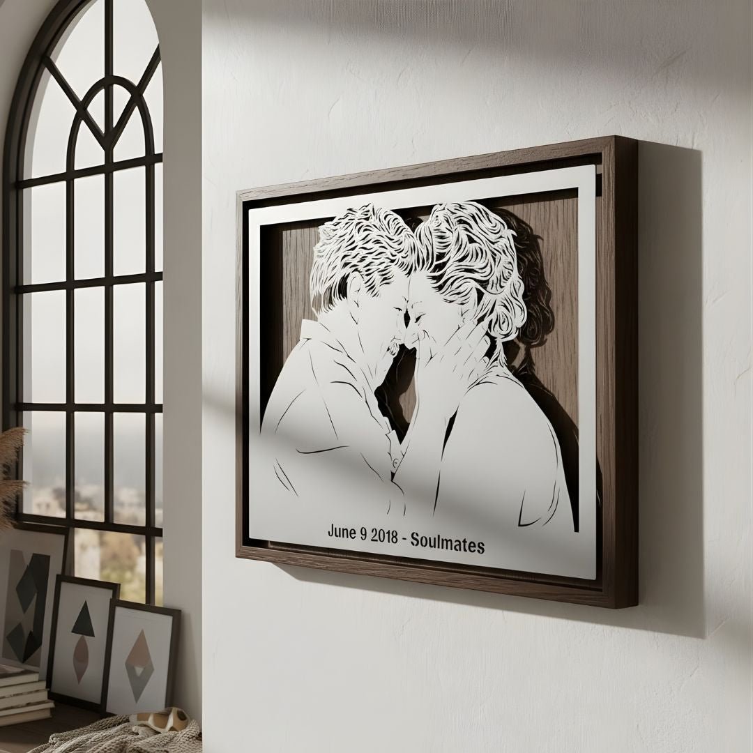 Couple forehead to forehead, landscape steel portrait in a walnut frame with their date below