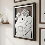 Couple embracing forehead to forehead, steel portrait in a walnut frame